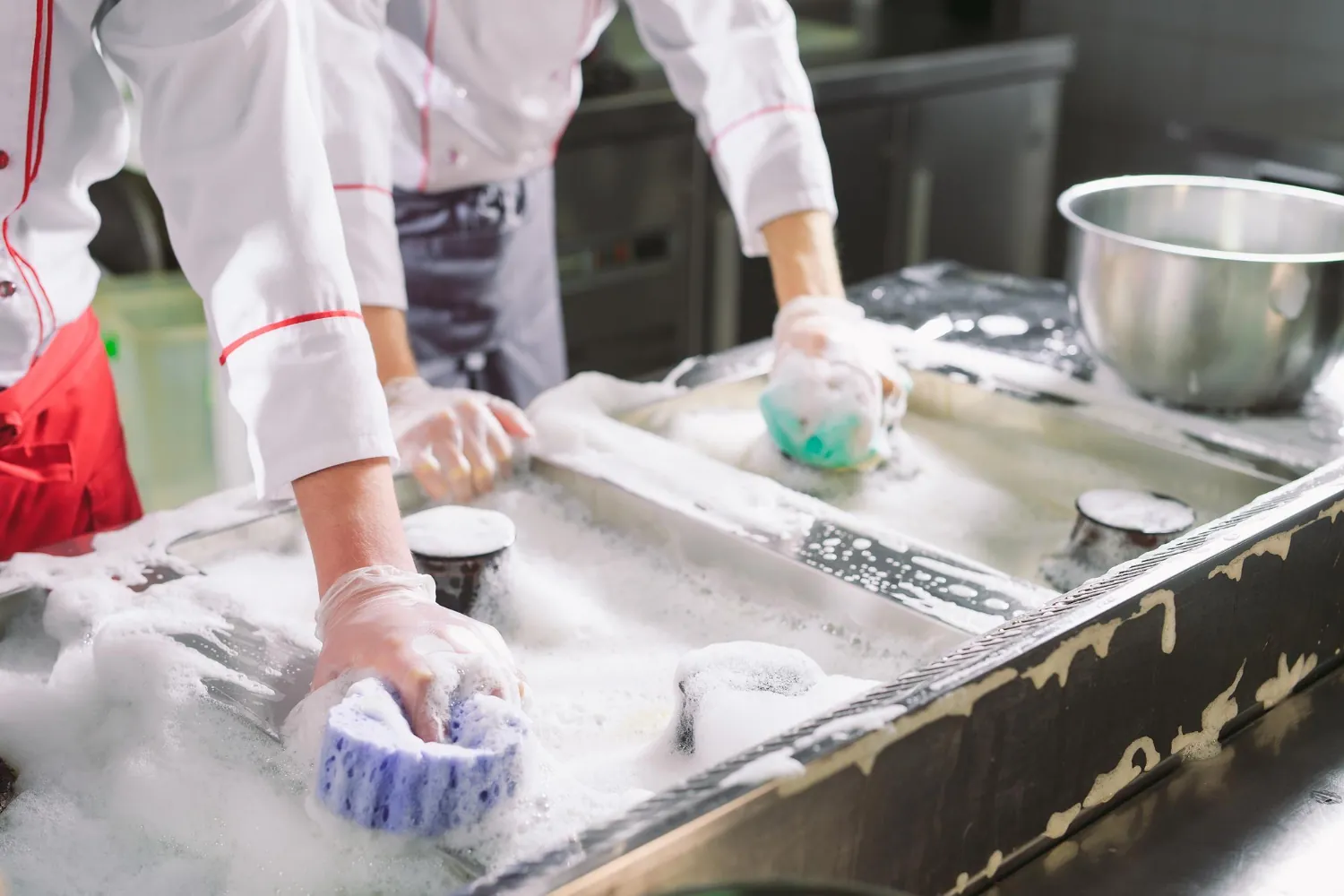 Staff cleaning kitchen preparing for busy day.webp?fit=300%2C200&ssl=1